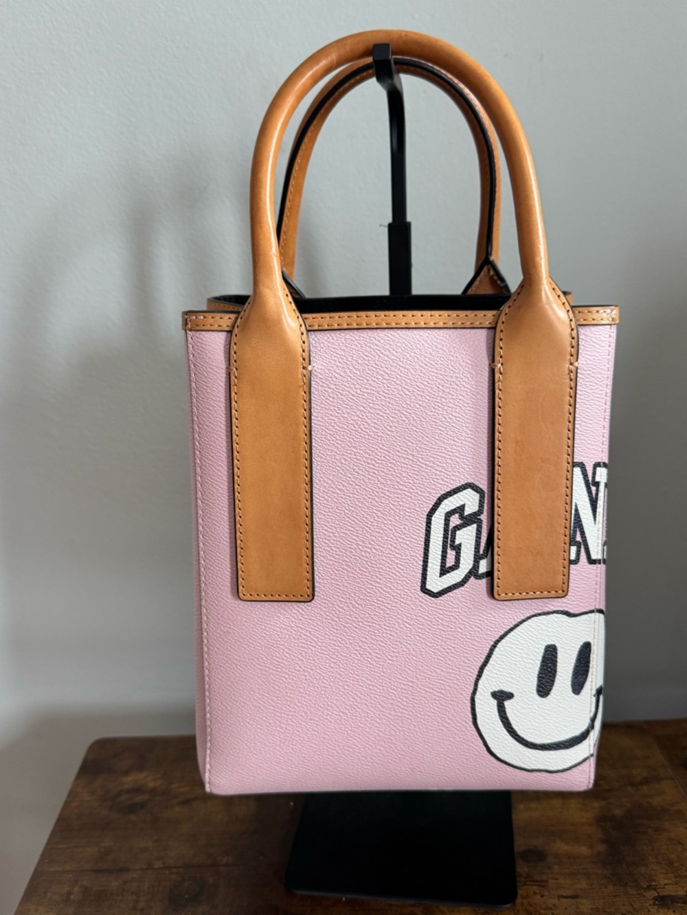 GANNI Banner Small Tote Bag in a light pink colorway featuring the iconic